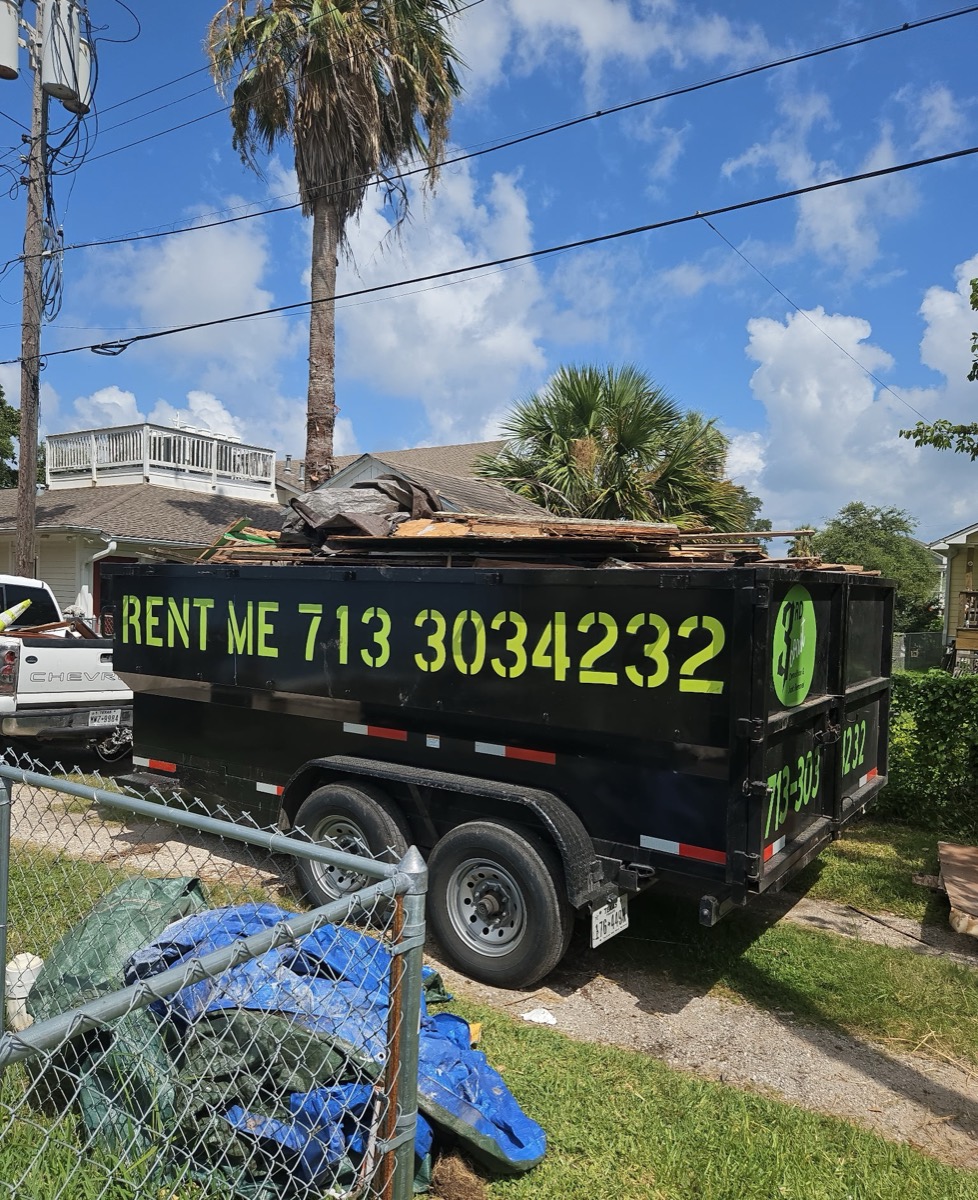 Dump trailer loaded with demolition debris