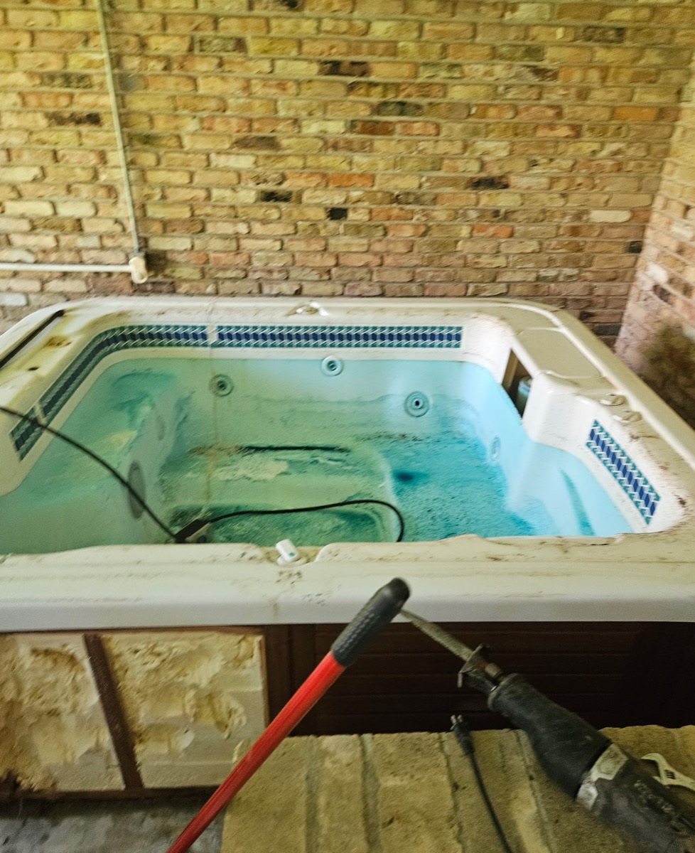Hot tub demolition in progress