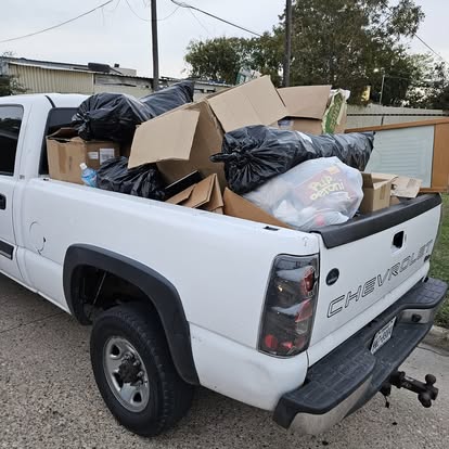 Truck bed loaded and hauled away